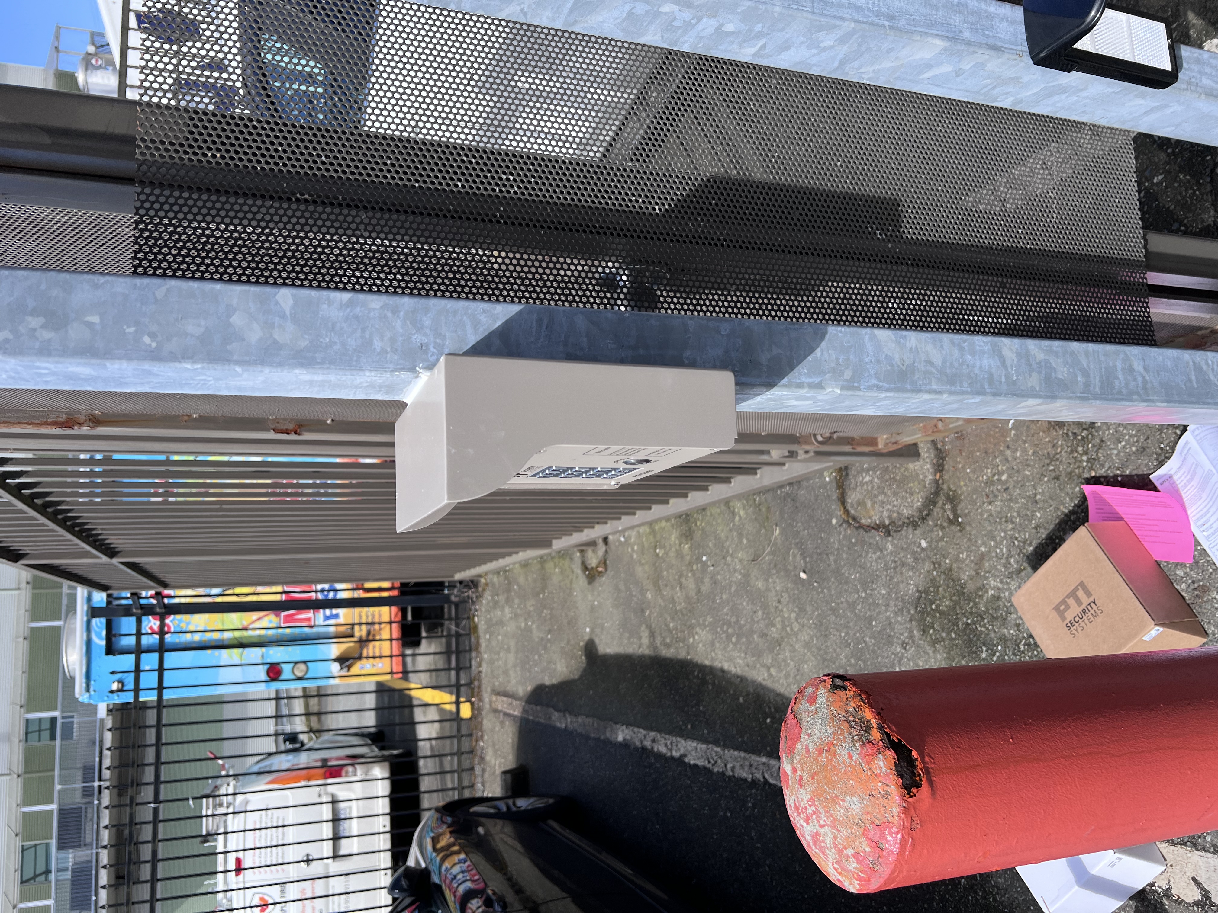 Outdoor security gate access control and intercom pedestal installation by Neo Security